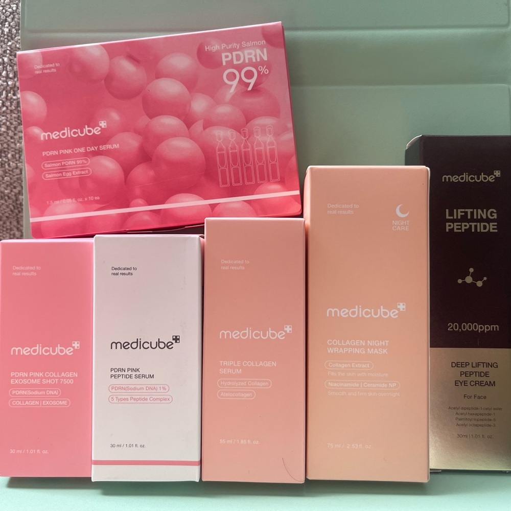 Medicube Skincare Set with Pink and Black Packaging